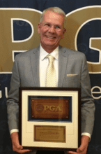 Robbie G with his award